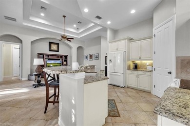 Welcome home to this elegant and well-maintained Stock Tivoli on The Classics Country Club At Lely Resort in Florida - for sale on GolfHomes.com, golf home, golf lot