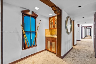 Luxury living in this Waterfront Mediterranean Estate in on The Diplomat Golf Resort and Spa in Florida - for sale on GolfHomes.com, golf home, golf lot