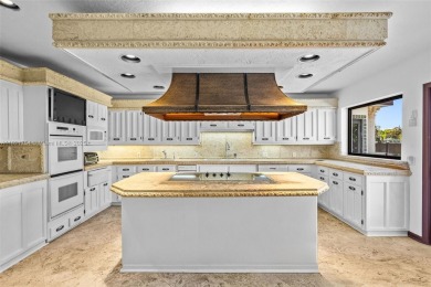 Luxury living in this Waterfront Mediterranean Estate in on The Diplomat Golf Resort and Spa in Florida - for sale on GolfHomes.com, golf home, golf lot