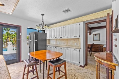 Luxury living in this Waterfront Mediterranean Estate in on The Diplomat Golf Resort and Spa in Florida - for sale on GolfHomes.com, golf home, golf lot
