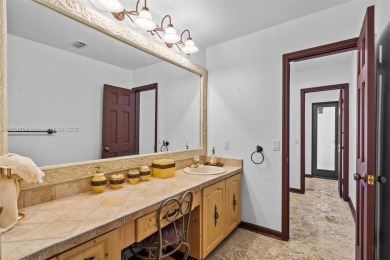 Luxury living in this Waterfront Mediterranean Estate in on The Diplomat Golf Resort and Spa in Florida - for sale on GolfHomes.com, golf home, golf lot