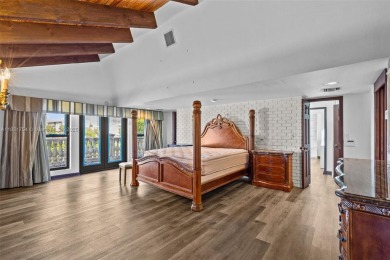 Luxury living in this Waterfront Mediterranean Estate in on The Diplomat Golf Resort and Spa in Florida - for sale on GolfHomes.com, golf home, golf lot