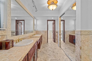 Luxury living in this Waterfront Mediterranean Estate in on The Diplomat Golf Resort and Spa in Florida - for sale on GolfHomes.com, golf home, golf lot