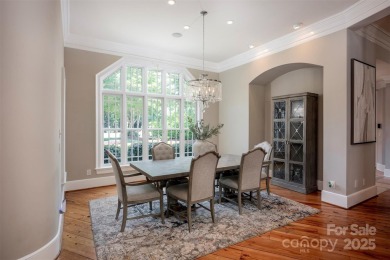Impeccable craftsmanship and 305' of pristine shoreline define on Trump National Golf Club Charlotte in North Carolina - for sale on GolfHomes.com, golf home, golf lot