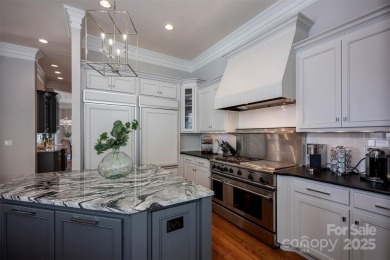 Impeccable craftsmanship and 305' of pristine shoreline define on Trump National Golf Club Charlotte in North Carolina - for sale on GolfHomes.com, golf home, golf lot