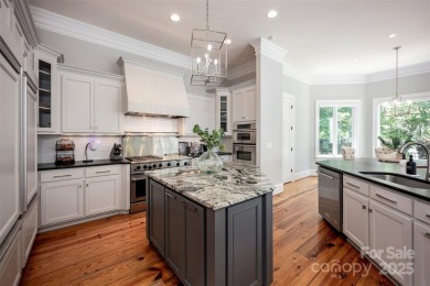 Impeccable craftsmanship and 305' of pristine shoreline define on Trump National Golf Club Charlotte in North Carolina - for sale on GolfHomes.com, golf home, golf lot