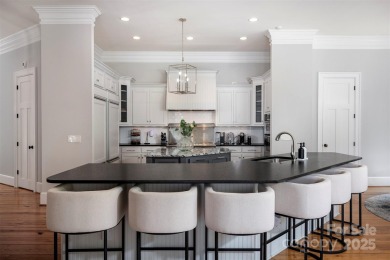 Impeccable craftsmanship and 305' of pristine shoreline define on Trump National Golf Club Charlotte in North Carolina - for sale on GolfHomes.com, golf home, golf lot