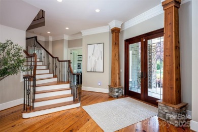 Impeccable craftsmanship and 305' of pristine shoreline define on Trump National Golf Club Charlotte in North Carolina - for sale on GolfHomes.com, golf home, golf lot