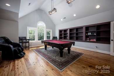 Impeccable craftsmanship and 305' of pristine shoreline define on Trump National Golf Club Charlotte in North Carolina - for sale on GolfHomes.com, golf home, golf lot