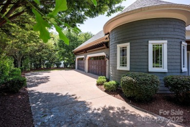 Impeccable craftsmanship and 305' of pristine shoreline define on Trump National Golf Club Charlotte in North Carolina - for sale on GolfHomes.com, golf home, golf lot