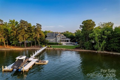 Impeccable craftsmanship and 305' of pristine shoreline define on Trump National Golf Club Charlotte in North Carolina - for sale on GolfHomes.com, golf home, golf lot