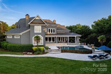 Impeccable craftsmanship and 305' of pristine shoreline define on Trump National Golf Club Charlotte in North Carolina - for sale on GolfHomes.com, golf home, golf lot