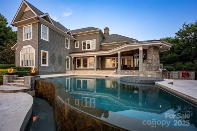 Impeccable craftsmanship and 305' of pristine shoreline define on Trump National Golf Club Charlotte in North Carolina - for sale on GolfHomes.com, golf home, golf lot
