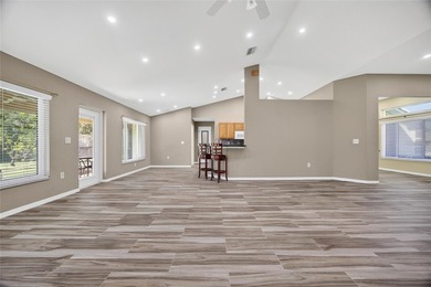 DEEP CREEK! IMPRESSIVE 4 BEDROOM, 2 BATH, 2 CAR GARAGE GREENBELT on Deep Creek Golf Club in Florida - for sale on GolfHomes.com, golf home, golf lot