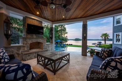 Impeccable craftsmanship and 305' of pristine shoreline define on Trump National Golf Club Charlotte in North Carolina - for sale on GolfHomes.com, golf home, golf lot