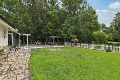 Beautifully updated 5 bed, 3 bath home with 2,069 SF featuring on Magnolia Point Golf and Country Club in Florida - for sale on GolfHomes.com, golf home, golf lot