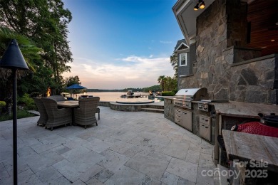 Impeccable craftsmanship and 305' of pristine shoreline define on Trump National Golf Club Charlotte in North Carolina - for sale on GolfHomes.com, golf home, golf lot