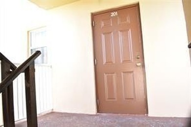 Two-bedroom, two-bathroom corner unit in the second floor in the on Sunrise Lakes Phase III in Florida - for sale on GolfHomes.com, golf home, golf lot