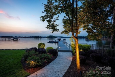 Impeccable craftsmanship and 305' of pristine shoreline define on Trump National Golf Club Charlotte in North Carolina - for sale on GolfHomes.com, golf home, golf lot