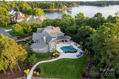 Impeccable craftsmanship and 305' of pristine shoreline define on Trump National Golf Club Charlotte in North Carolina - for sale on GolfHomes.com, golf home, golf lot