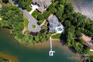 Impeccable craftsmanship and 305' of pristine shoreline define on Trump National Golf Club Charlotte in North Carolina - for sale on GolfHomes.com, golf home, golf lot