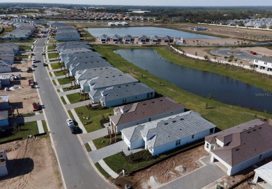 DON'T LOOK AT A WALL. Welcome to your BRAND NEW and upgraded on Esplanade Golf and Country at Lakewood Ranch in Florida - for sale on GolfHomes.com, golf home, golf lot