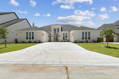 Unmatched Lakefront Views & Exclusive Contemporary Luxury just 1 on The Golf Club at Resort Eagle Mountain Lake in Texas - for sale on GolfHomes.com, golf home, golf lot