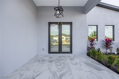 Brand new construction with nearly 2,800 sq. ft. of thoughtfully on Burnt Store Golf Club in Florida - for sale on GolfHomes.com, golf home, golf lot