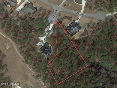 Consider this large, wooded lot, tucked away off the 12th green on Carolina Colours Golf Club in North Carolina - for sale on GolfHomes.com, golf home, golf lot