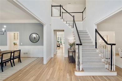 Quality craftsmanship, timeless style, and thoughtful on The Golf Club of Georgia in Georgia - for sale on GolfHomes.com, golf home, golf lot