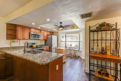 Welcome to 3454 Niblick Court, a beautifully maintained end-unit on Seven Springs Golf and Country Club in Florida - for sale on GolfHomes.com, golf home, golf lot