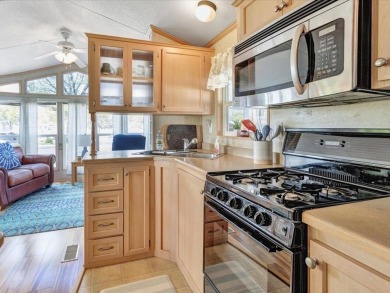 Welcome to this very cute and stylish 1-bedroom seasonal cottage on Apple Island Golf Course At Apple Island Resort in Vermont - for sale on GolfHomes.com, golf home, golf lot