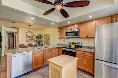 Welcome to 3454 Niblick Court, a beautifully maintained end-unit on Seven Springs Golf and Country Club in Florida - for sale on GolfHomes.com, golf home, golf lot