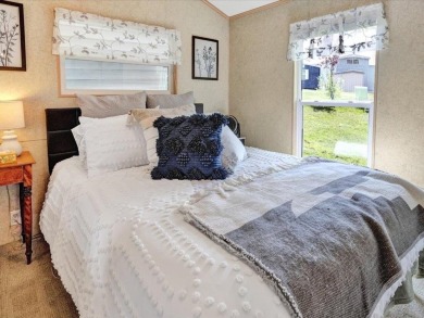 Welcome to this very cute and stylish 1-bedroom seasonal cottage on Apple Island Golf Course At Apple Island Resort in Vermont - for sale on GolfHomes.com, golf home, golf lot