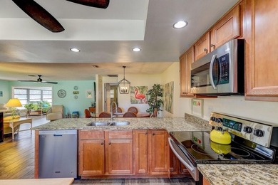 Welcome to 3454 Niblick Court, a beautifully maintained end-unit on Seven Springs Golf and Country Club in Florida - for sale on GolfHomes.com, golf home, golf lot