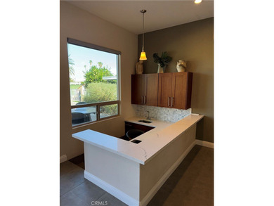 Immaculate turnkey home LOCATED ON THE GOLF COURSE in Palm on Palm Desert Country Club in California - for sale on GolfHomes.com, golf home, golf lot