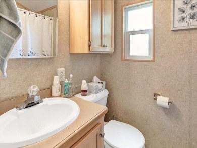 Welcome to this very cute and stylish 1-bedroom seasonal cottage on Apple Island Golf Course At Apple Island Resort in Vermont - for sale on GolfHomes.com, golf home, golf lot