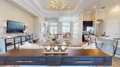 This stunning home boasts panoramic views of the lake and golf on Panther Run Golf Club in Florida - for sale on GolfHomes.com, golf home, golf lot