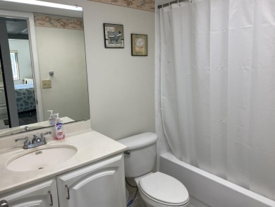 This one bedroom, one bath in the desirable community of Ocean on Ocean Village Golf Course in Florida - for sale on GolfHomes.com, golf home, golf lot