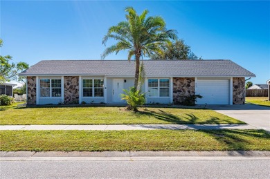 Welcome to your beautifully updated Florida retreat in the on Duffys Golf Center in Florida - for sale on GolfHomes.com, golf home, golf lot