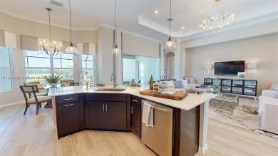 This stunning home boasts panoramic views of the lake and golf on Panther Run Golf Club in Florida - for sale on GolfHomes.com, golf home, golf lot