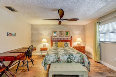 Welcome to 3454 Niblick Court, a beautifully maintained end-unit on Seven Springs Golf and Country Club in Florida - for sale on GolfHomes.com, golf home, golf lot