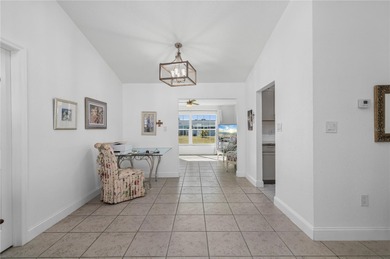 Welcome to your beautifully updated Florida retreat in the on Duffys Golf Center in Florida - for sale on GolfHomes.com, golf home, golf lot