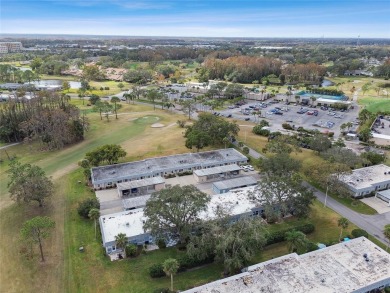 Embrace MAINTENANCE-FREE LIVING in this ALL AGES 2/2 condo whose on Seven Springs Golf and Country Club in Florida - for sale on GolfHomes.com, golf home, golf lot