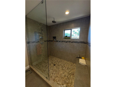 Immaculate turnkey home LOCATED ON THE GOLF COURSE in Palm on Palm Desert Country Club in California - for sale on GolfHomes.com, golf home, golf lot