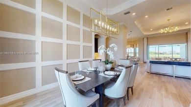 This stunning home boasts panoramic views of the lake and golf on Panther Run Golf Club in Florida - for sale on GolfHomes.com, golf home, golf lot