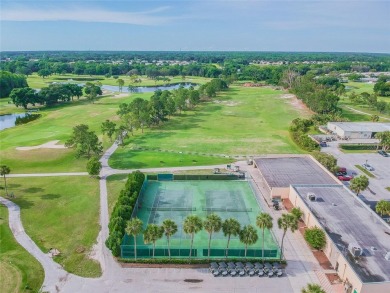 Embrace MAINTENANCE-FREE LIVING in this ALL AGES 2/2 condo whose on Seven Springs Golf and Country Club in Florida - for sale on GolfHomes.com, golf home, golf lot