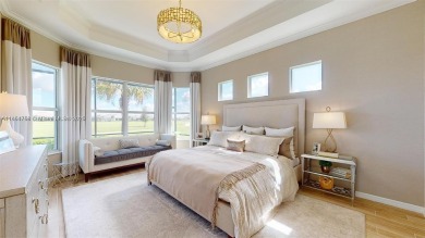 This stunning home boasts panoramic views of the lake and golf on Panther Run Golf Club in Florida - for sale on GolfHomes.com, golf home, golf lot