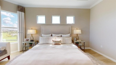 This stunning home boasts panoramic views of the lake and golf on Panther Run Golf Club in Florida - for sale on GolfHomes.com, golf home, golf lot