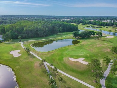 Embrace MAINTENANCE-FREE LIVING in this ALL AGES 2/2 condo whose on Seven Springs Golf and Country Club in Florida - for sale on GolfHomes.com, golf home, golf lot